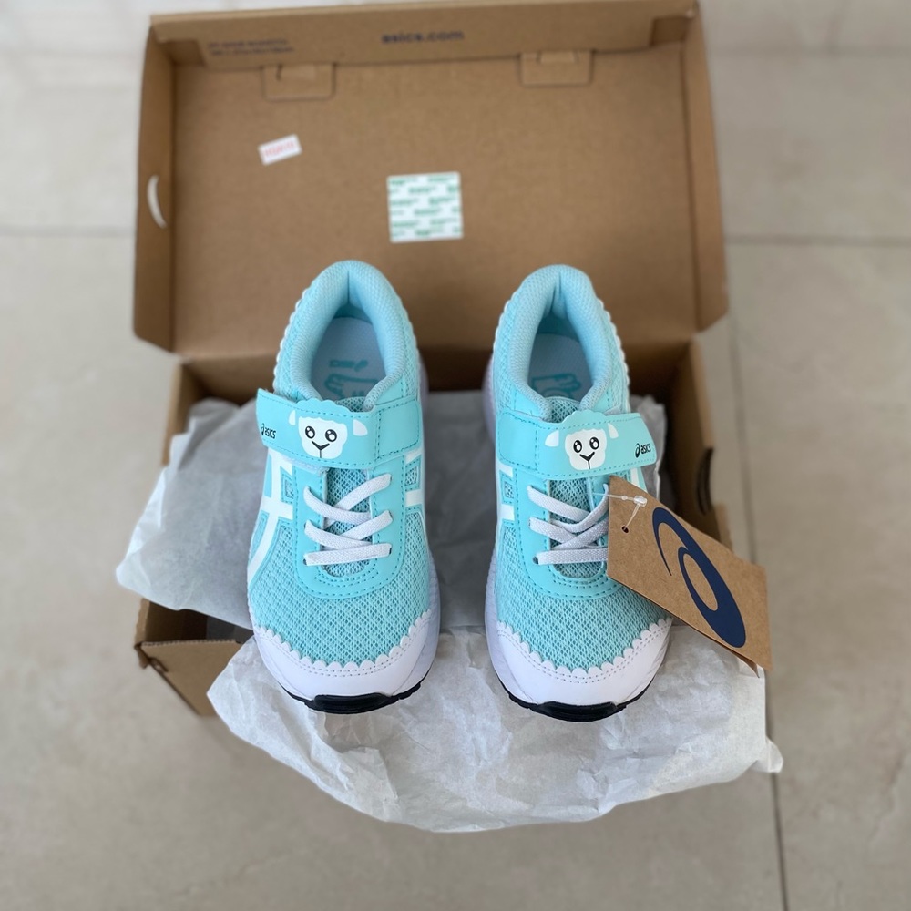 Kids Asics sneakers size 1.